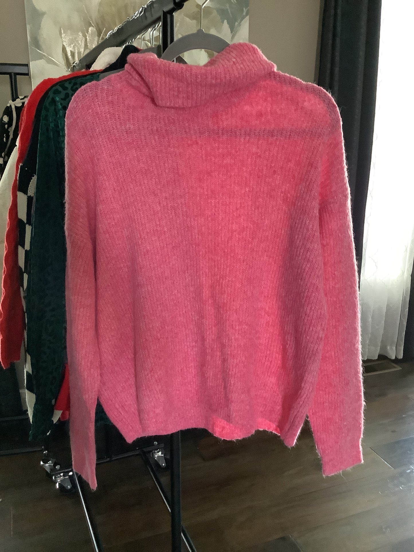 Pink turtle-neck sweater