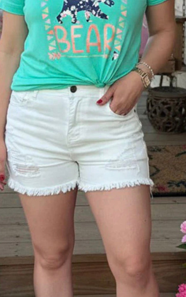 White distressed shorts